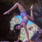 Paulina Milligan in a handstand near the natural bridge in Arizona. 